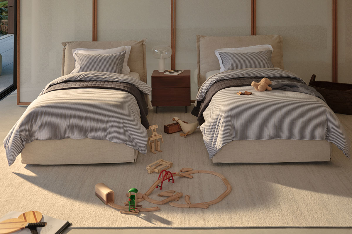 Two king single beds in a child’s bedroom fit for siblings or twins. Styling is contemporary and coastal.