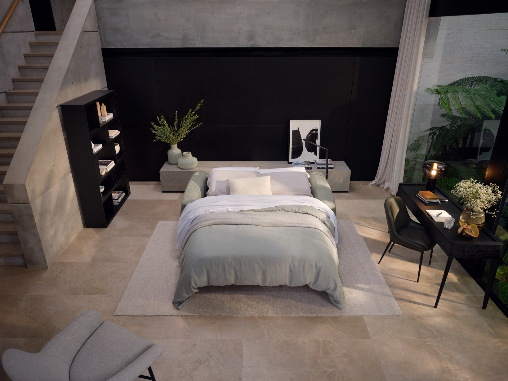 A light green open sofa bed in a modern living space.